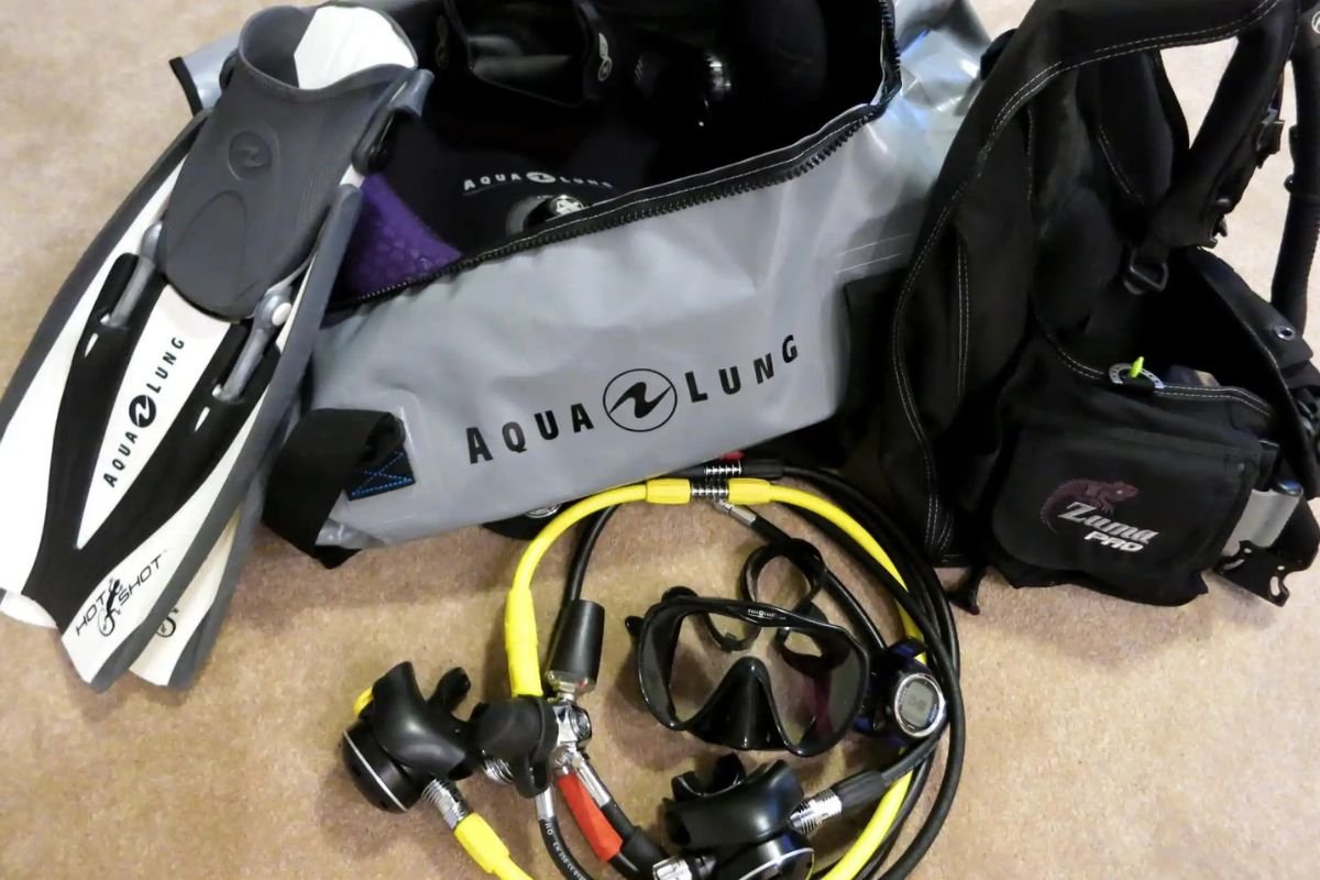 preparing dive gear for Togean Islands tour package