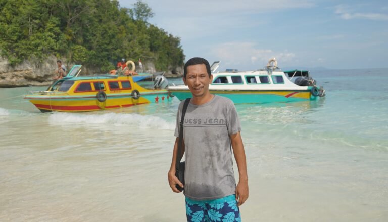 WAYAWtour founder in karina beach, Togean Islands
