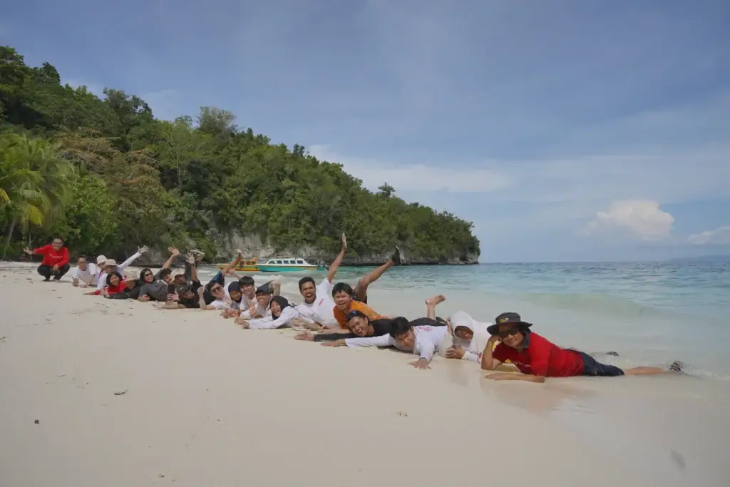 enjoying white sandy beach -travel guide togean islands